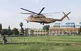 A military helicopter carrying IDF soldiers wounded in an explosion during a patrol along the Gaza border arrives at Beersheba's Soroka Medical Center on February 17, 2018. (Screen capture; Twitter)