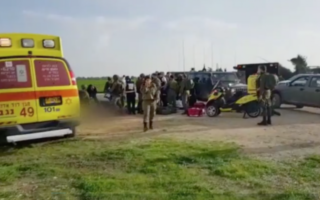 Israeli troops and first responders at the Gaza border following an explosion that targeted an IDF patrol, February 17, 2018 (Hadashot news screenshot) Israeli troops and first responders at the Gaza border following an explosion that targeted an IDF patrol, February 17, 2018 (Hadashot news screenshot)
