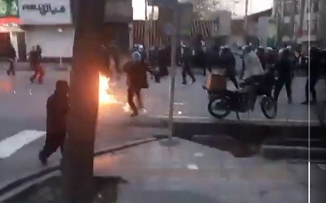 A screenshot of a video from Twitter reporting to show clashes between Sufi protesters and police in Tehran on February 19, 2018. (Screen capture: Twitter) A screenshot of a video from Twitter reporting to show clashes between Sufi protesters and police in Tehran on February 19, 2018. (Screen capture: Twitter)