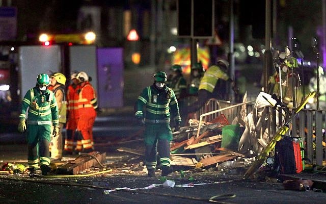 Emergency personnel at the scene of an incident in Leicester, central England. Four people were hospitalized in critical condition following an explosion that left a building in the in flames Sunday, local emergency agencies said, February 25, 2018. (Aaron Chown/PA via AP) Emergency personnel at the scene of an incident in Leicester, central England. Four people were hospitalized in critical condition following an explosion that left a building in the in flames Sunday, local emergency agencies said, February 25, 2018. (Aaron Chown/PA via AP)
