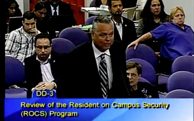 This Feb. 18, 2015 image taken from video provided by Broward County Public Schools shows school resource officer Scot Peterson during a school board meeting of Broward County, Fla. (Broward County Public Schools via AP) This Feb. 18, 2015 image taken from video provided by Broward County Public Schools shows school resource officer Scot Peterson during a school board meeting of Broward County, Fla. (Broward County Public Schools via AP)