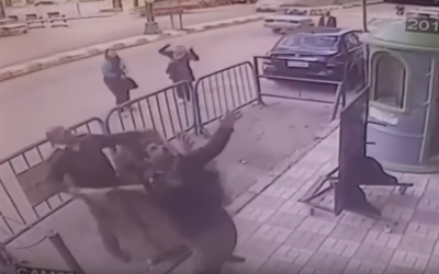 Three Egyptian policemen were able to catch a five-year-old child as he fell from a third-floor apartment balcony in the southern city of Assiut in a video released in February 2018. (Screen capture: YouTube)