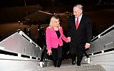 Illustrative: Prime Minister Benjamin Netanyahu and his wife Sara Netanyahu board a plane at Ben Gurion Airport before departing for Munich, February 15, 2017. (Amos Ben Gershom/GPO/File)