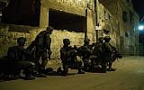 Illustrative: IDF soldiers search for the perpetrators of the terror attack that killed Rabbi Raziel Shevach in the northern West Bank village of Burqin, on February 4, 2017. (IDF spokesperson)