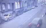 A man and his son diving to avoid a car heading toward them in Antwerp on February 3, 2018. Screen capture: YouTube)