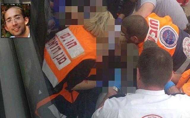 Magen David Adom paramedics treat Rabbi Itamar Ben-Gal (inset), who was fatally stabbed in a terror attack at the West Bank settlement of Ariel, February 5, 2018. (MDA spokesperson) Magen David Adom paramedics treat Rabbi Itamar Ben-Gal (inset), who was fatally stabbed in a terror attack at the West Bank settlement of Ariel, February 5, 2018. (MDA spokesperson)