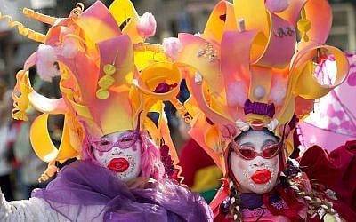 Participants at a traditional Carnival parade in Maastricht, the Netherlands, March 2, 2014. (Marcel Van Hoorn/AFP/Getty Images/via JTA)