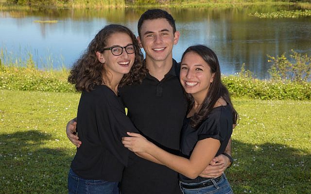 From left to right: Gabby, Cole and Serena Deutch drew inspiration from the Purim story for their fundraising initiative. (Courtesy of Gabby Deutch via JTA) From left to right: Gabby, Cole and Serena Deutch drew inspiration from the Purim story for their fundraising initiative. (Courtesy of Gabby Deutch via JTA)