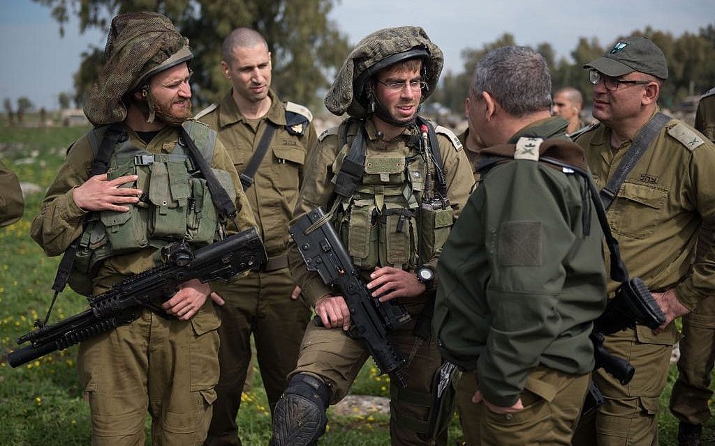 IDF Chief of Staff Gadi Eisenkot meets with soldiers taking part in a large exercise  in northern Israel meant to simulate war in Lebanon on February 20, 2018. (Israel Defense Forces)