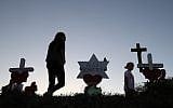 A makeshift memorial erected in front of Marjory Stoneman Douglas High School in Parkland, Florida, days after the shooting that left 17 students and teachers dead, February 18, 2018. (Joe Raedle/Getty Images via JTA)