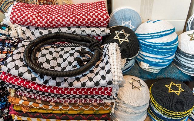Kippahs and keffiyehs for sale in the Old City of Jerusalem (iStock)