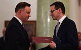 Polish President Andrzej Duda, left, nominates Mateusz Morawiecki to be prime minister at the presidential palace in Warsaw, December 11, 2017. (Janek Skarzynski/AFP/Getty Images via JTA)
