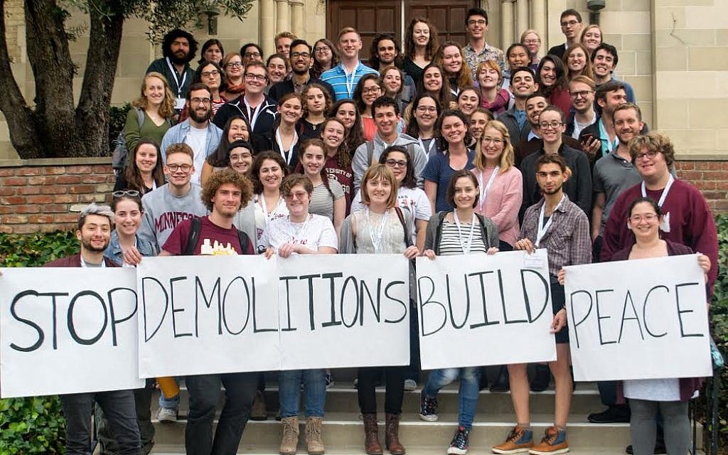Students pose with signs at J Street U's West Coast workshop, a gather of top West Coast leaders for training and strategy meetings on UCLA's campus. (courtesy) Students pose with signs at J Street U's West Coast workshop, a gather of top West Coast leaders for training and strategy meetings on UCLA's campus. (courtesy)