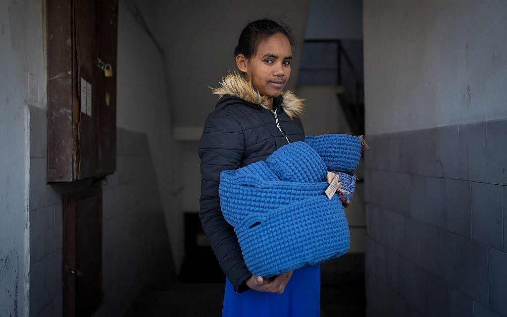 Zayd, an asylum seeker who works with Kucinate - African Refugee Women's Collective, in Tel Aviv on February 14, 2018. (Miriam Alster/Flash90)