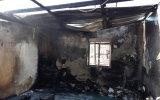 A photo taken by firefighters from Beersheba of a house in Hura after a fire in which three children were hurt, February 22, 2018. (Beersheba Fire and Rescue/Twitter screen capture)