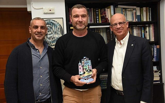 Liev Schreiber (center) receiving a gift from Tel Aviv University president Joseph Klafter (right) and Raz Joseph, who heads the university's film and television school (Courtesy Yisrael Hadari) Liev Schreiber (center) receiving a gift from Tel Aviv University president Joseph Klafter (right) and Raz Joseph, who heads the university's film and television school (Courtesy Yisrael Hadari)