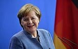 This file photo taken on February 27, 2018, shows German Chancellor Angela Merkel during a press conference at the Chancellery in Berlin. (AFP Photo/Tobias Schwarz)