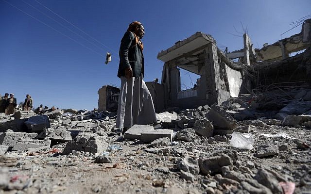 Yemenis check the damage in the aftermath of a reported air strike by the Saudi-led coalition in the Yemeni capital Sanaa on March 8, 2018. (AFP PHOTO / Mohammed HUWAIS) Yemenis check the damage in the aftermath of a reported air strike by the Saudi-led coalition in the Yemeni capital Sanaa on March 8, 2018. (AFP PHOTO / Mohammed HUWAIS)