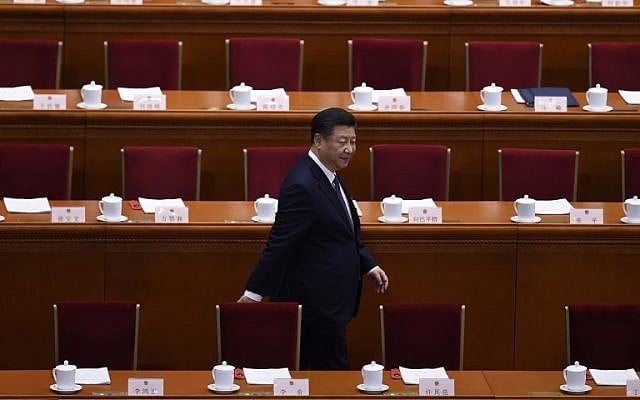 China's President Xi Jinping arrives for the third plenary session of the first session of the 13th National People's Congress (NPC) at the Great Hall of the People in Beijing on March 11, 2018. (AFP PHOTO / WANG ZHAO)