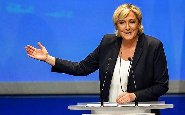 French far-right party Front National president Marine Le Pen speaks during her party's congress on March 11, 2018 in Lille, north of France, after being re-elected for a third term as leader. (AFP PHOTO / PHILIPPE HUGUEN) French far-right party Front National president Marine Le Pen speaks during her party's congress on March 11, 2018 in Lille, north of France, after being re-elected for a third term as leader. (AFP PHOTO / PHILIPPE HUGUEN)
