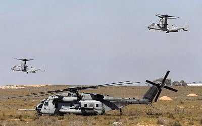 A US army Sikorsky CH-53E Super Stallion and two US V-22 Ospreys take part in a training exercise during the joint Israeli-US military Juniper Cobra air defense drill at the Tzeelim urban warfare training center in southern Israel on March 12, 2018. (Jack Guez/AFP)