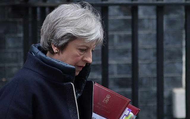 File: Britain's Prime Minister Theresa May leaves 10 Downing street for the weekly Prime Minister Question (PMQ) session in the House of Commons in London on March 14, 2018.
(AFP Photo/Daniel Leal-Olivas) File: Britain's Prime Minister Theresa May leaves 10 Downing street for the weekly Prime Minister Question (PMQ) session in the House of Commons in London on March 14, 2018.
(AFP Photo/Daniel Leal-Olivas)