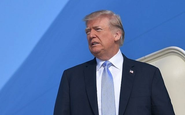 US President Donald Trump boards Air Force One before departing from Los Angeles International Airport in Los Angeles on March 14, 2018. (AFP/ MANDEL NGAN) US President Donald Trump boards Air Force One before departing from Los Angeles International Airport in Los Angeles on March 14, 2018. (AFP/ MANDEL NGAN)