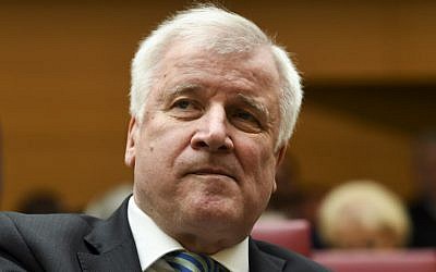 German Interior Minister Horst Seehofer sits in Bavaria's State parliament in Munich, where his successor as Bavarian State premier is to be elected on March 16, 2018. (AFP Photo/Christof Stache)