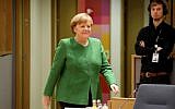 Germany's Chancellor Angela Merkel arrives to a meeting on the second day of a summit of European Union (EU) leaders at the European Council headquarter in Bruxelles, on March 23, 2018. (AFP/Ludovic Marin)