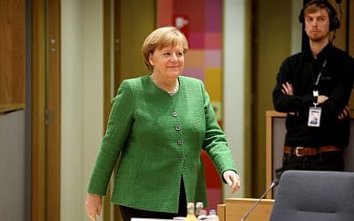 Germany's Chancellor Angela Merkel arrives to a meeting on the second day of a summit of European Union (EU) leaders at the European Council headquarter in Bruxelles, on March 23, 2018. (AFP/Ludovic Marin)