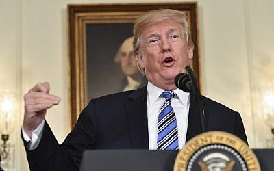US President Donald Trump speaks about the spending bill during a press conference in the Diplomatic Reception Room at the White House on March 23, 2018. (AFP Photo/Nicholas Kamm)