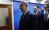 Prime Minister Benjamin Netanyahu arrives for  the weekly cabinet meeting at the Prime Minister's Office in Jerusalem on March 25, 2018. (AFP Photo/AFP Photo and EPA/Abir Sultan)