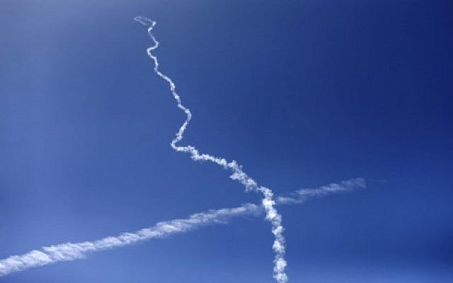 The smoke of a rocket fired by Palestinian Hamas terrorists is seen over Gaza City on March 25, 2018 as they take part in a military drill. (AFP/ MAHMUD HAMS) The smoke of a rocket fired by Palestinian Hamas terrorists is seen over Gaza City on March 25, 2018 as they take part in a military drill. (AFP/ MAHMUD HAMS)
