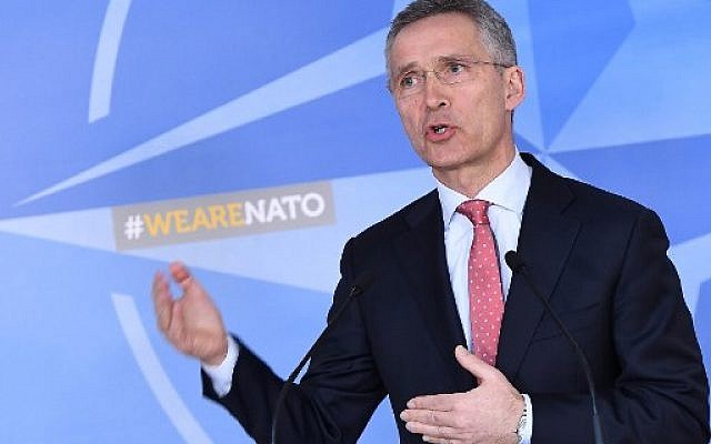 NATO Secretary General Jens Stoltenberg addresses the press at NATO headquarters in Brussels on March 27, 2018.  (AFP PHOTO / Emmanuel DUNAND)