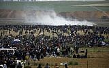 Palestinians take part in demonstrations near the border with Israel east of Jabalya in the northern Gaza strip on March 30, 2018. (AFP/Mohammed Abed)