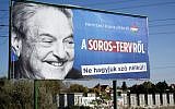 A billboard with a poster of Hungarian-American billionaire and philanthropist George Soros with the words 'National consultation about the Soros plan - Don't let it pass without any words' is seen in Budapest on October 16, 2017. (Attila Kisbenedek/AFP)