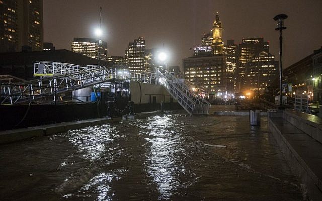 BOSTON, MA - MARCH 02: Flooding along Long Wharf as high tide approaches during a large coastal storm on March 2, 2018 in Boston, Massachusetts. (Scott Eisen/Getty Images/AFP) BOSTON, MA - MARCH 02: Flooding along Long Wharf as high tide approaches during a large coastal storm on March 2, 2018 in Boston, Massachusetts. (Scott Eisen/Getty Images/AFP)