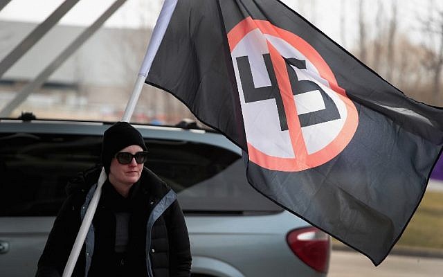 Demonstrators at Michigan State University protest a speech by white nationalist Richard Spencer, who popularized the term 'alt-right', on March 5, 2018 in East Lansing, Michigan. Spencer was granted permission to speak after suing the university which is currently on spring break.   (Scott Olson/Getty Images/AFP)