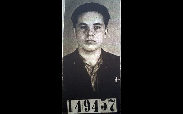An undated photo of Michael Karkoc that was part of his application for German citizenship filed with the Nazi SS-run immigration office on Feb. 14, 1940. (AP Photo/U.S. National Archives, File) An undated photo of Michael Karkoc that was part of his application for German citizenship filed with the Nazi SS-run immigration office on Feb. 14, 1940. (AP Photo/U.S. National Archives, File)