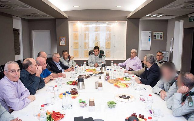Head of Israeli Military Intelligence, Maj. Gen. Herzl Halevi, center, speaks with several former senior IDF officials during a conference on March 20, 2018. (Israel Defense Forces) Head of Israeli Military Intelligence, Maj. Gen. Herzl Halevi, center, speaks with several former senior IDF officials during a conference on March 20, 2018. (Israel Defense Forces)