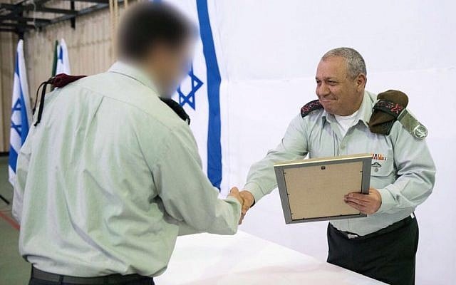IDF chief Gadi Eisenkot awards an official commendation to the Sayeret Matkal and Military Intelligence special missions units on March 27, 2018. (Israel Defense Forces) IDF chief Gadi Eisenkot awards an official commendation to the Sayeret Matkal and Military Intelligence special missions units on March 27, 2018. (Israel Defense Forces)