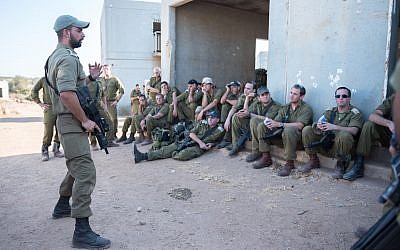 Illustrative. Israeli officers listen to a commander during an exercise in northern Israel on September 12, 2017. (Israel Defense Forces/Flickr)