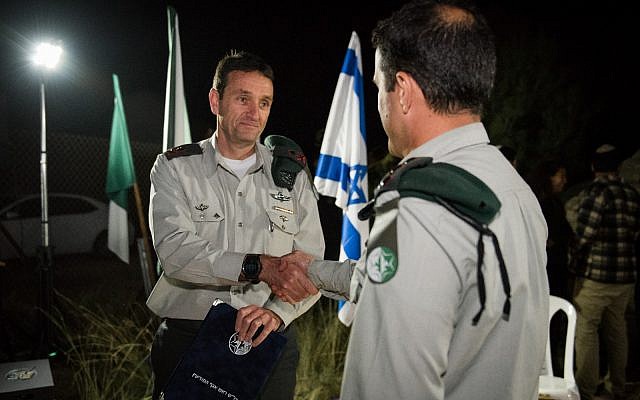 Illustrative: Military Intelligence chief Maj. Gen. Herzl Halevi awards the commander of Unit 504 with an official commendation in March 2018. For security reasons, the commander's identity is classified. (Israel Defense Forces) Illustrative: Military Intelligence chief Maj. Gen. Herzl Halevi awards the commander of Unit 504 with an official commendation in March 2018. For security reasons, the commander's identity is classified. (Israel Defense Forces)