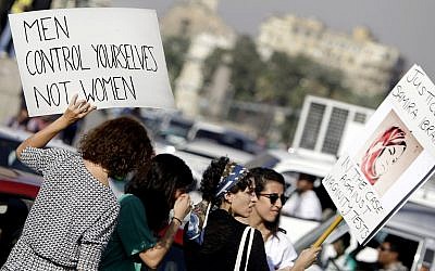 Illustrative: In this June 14, 2014 photo, Egyptian women hold banners during a protest against sexual harassment in Cairo, Egypt. (AP Photo/Amr Nabil)