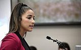 In this file photo from January 19, 2018, Olympic gold medalist Aly Raisman gives her victim impact statement in Lansing, Michigan, during the fourth day of sentencing for former sports doctor Larry Nassar, who pled guilty to multiple counts of sexual assault. (Dale G. Young/Detroit News via AP, File)