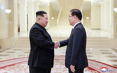 In this photo from March 5, 2018, provided by the North Korean government, North Korean leader Kim Jong Un, left, shakes hands with South Korean National Security Director Chung Eui-yong in Pyongyang, North Korea. (Korean Central News Agency/Korea News Service via AP)