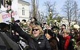 Anti-government protesters shout slogans during ceremonies marking the 50th anniversary of student protests that were exploited by the communists to purge Jews from Poland, at the Warsaw University in Warsaw, Poland, Thursday, March 8, 2018. (AP /Alik Keplicz)