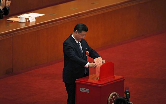 Chinese President Xi Jinping casts his vote for an amendment to China's constitution that will abolish term limits on the presidency and enable him to rule indefinitely, during a plenary session of the National People's Congress at the Great Hall of the People in Beijing, March 11, 2018. (AP Photo/Andy Wong) Chinese President Xi Jinping casts his vote for an amendment to China's constitution that will abolish term limits on the presidency and enable him to rule indefinitely, during a plenary session of the National People's Congress at the Great Hall of the People in Beijing, March 11, 2018. (AP Photo/Andy Wong)