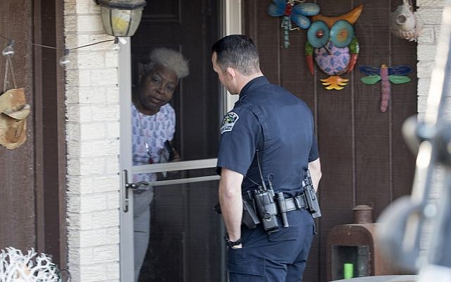 Authorities work on the scene after multiple explosions in Austin on Monday, March 12, 2018. (Ricardo B. Brazziell/Austin American-Statesman via AP)