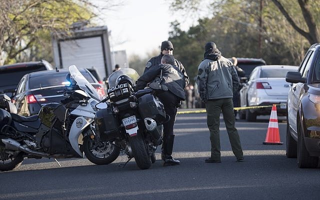 Authorities work on the scene after multiple explosions in Austin on Monday, March 12, 2018. (Ricardo B. Brazziell/Austin American-Statesman via AP) Authorities work on the scene after multiple explosions in Austin on Monday, March 12, 2018. (Ricardo B. Brazziell/Austin American-Statesman via AP)